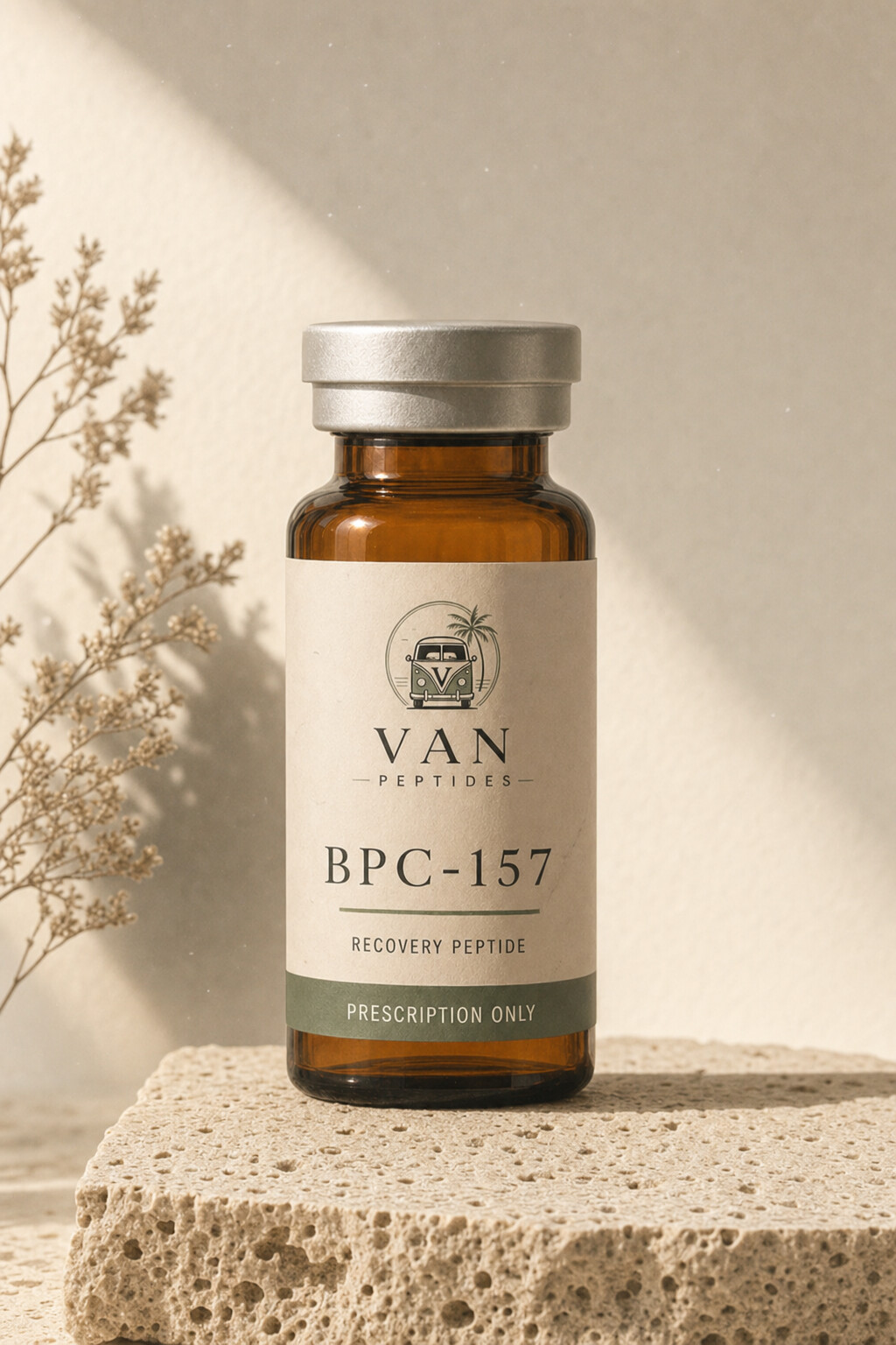 Amber apothecary vial with a cream label reading BPC-157, Prescription Only, on a travertine surface