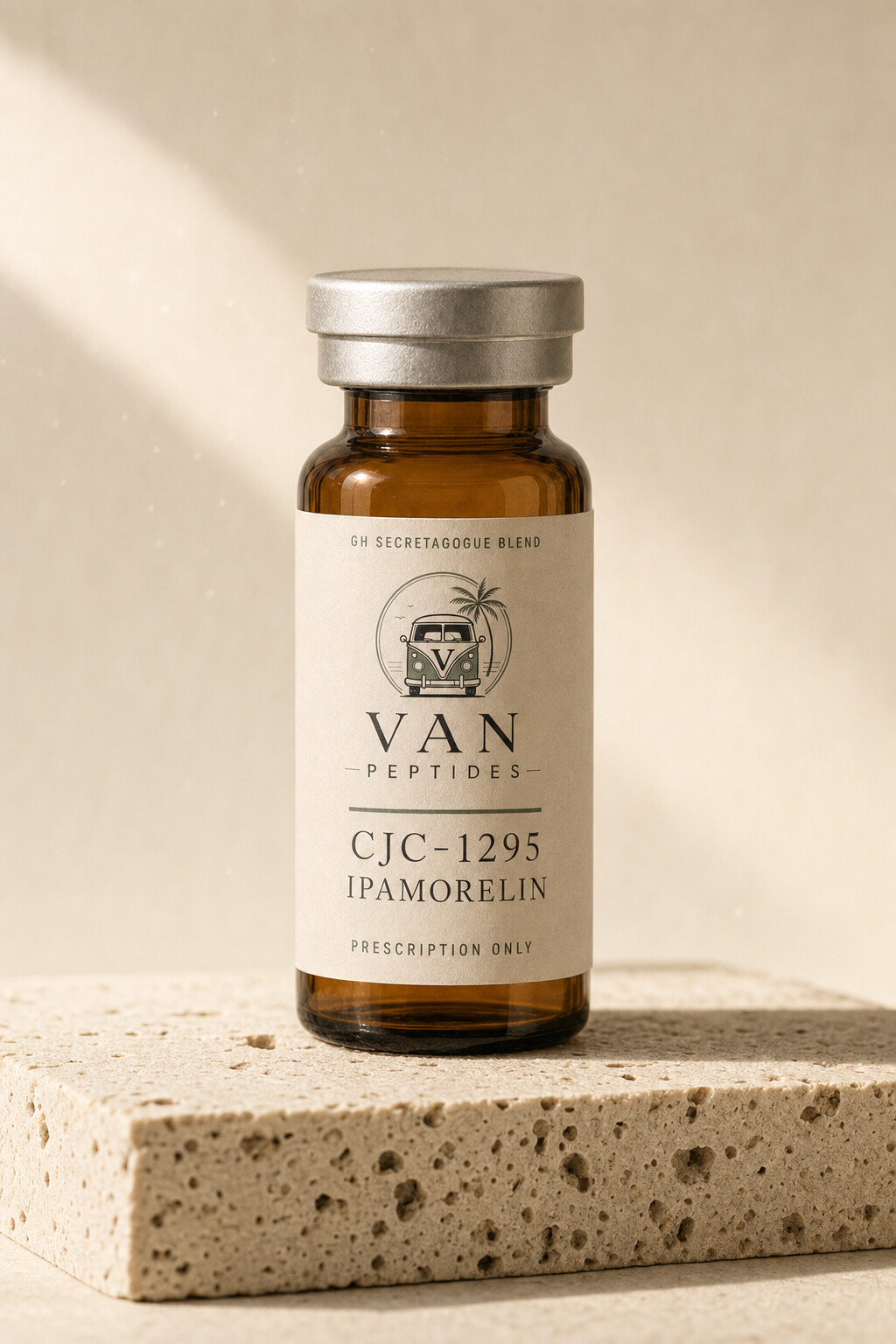 Amber apothecary vial with a cream label reading CJC-1295 / Ipamorelin, Prescription Only, on a travertine surface