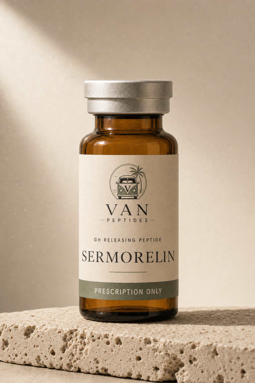 Amber apothecary vial with a cream label reading Sermorelin (High Dose), Prescription Only, on a travertine surface