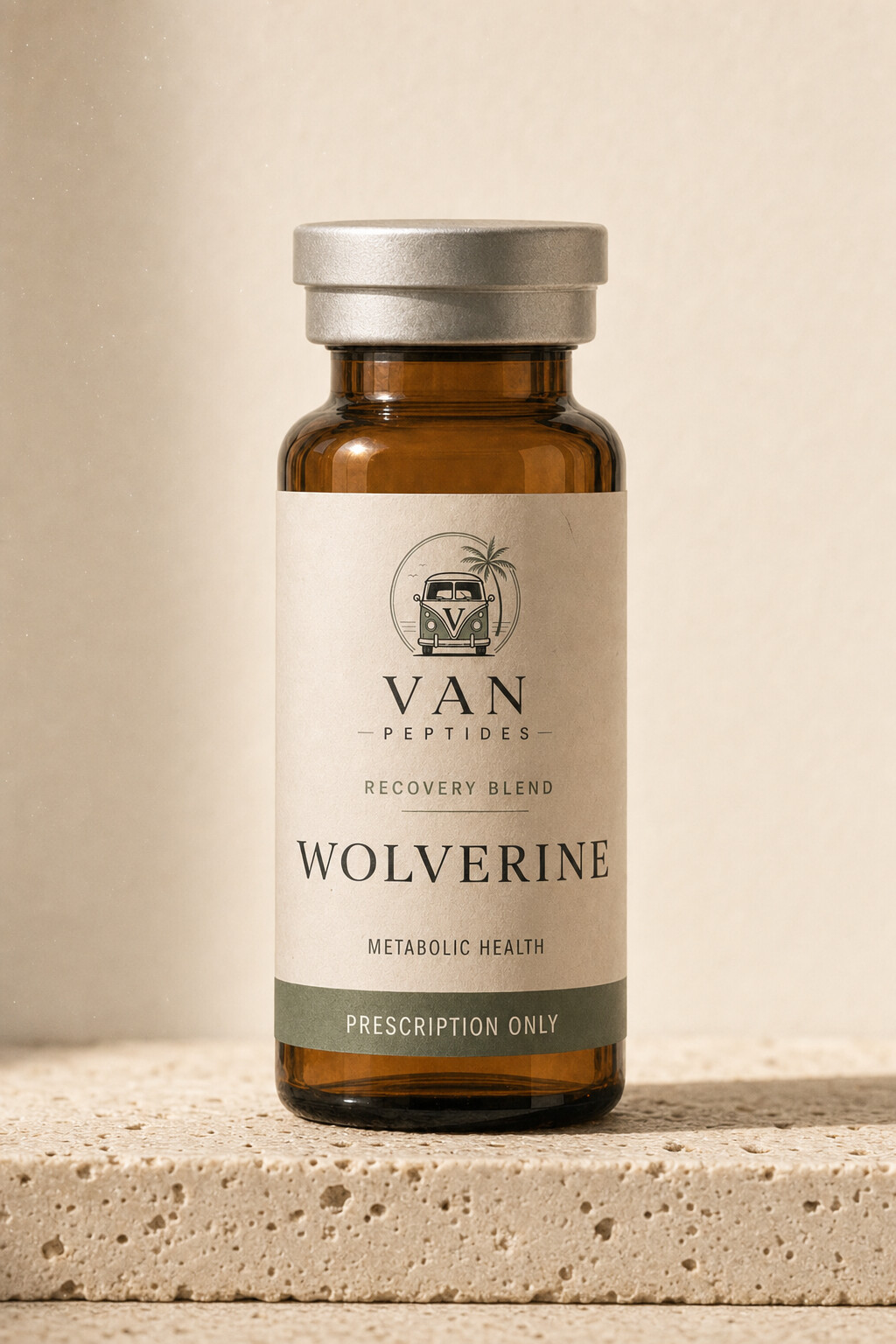 Amber apothecary vial with a cream label reading Wolverine, Prescription Only, on a travertine surface